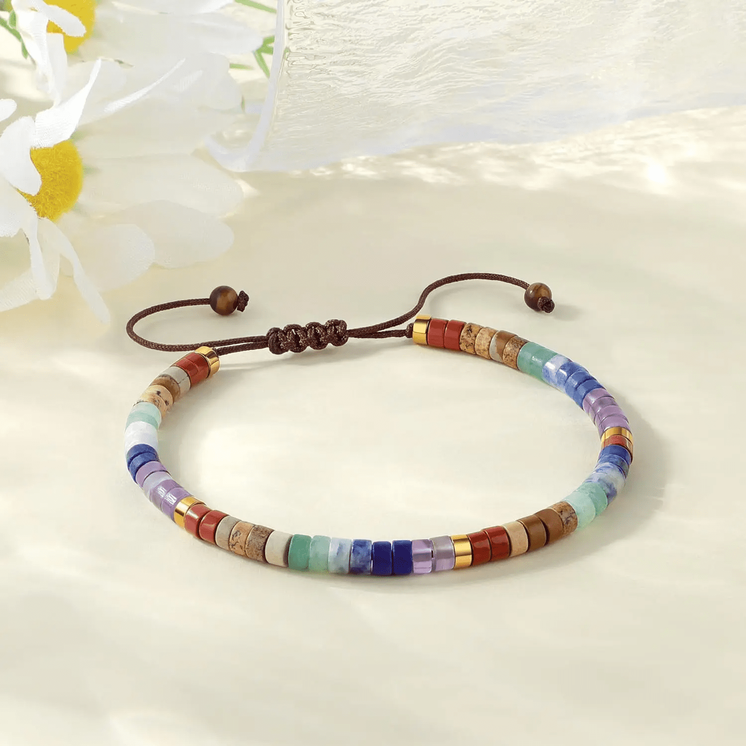 Buy KIBO 7 Chakra Crystal Bracelet — Full Energy Alignment | Kibo Space Jewelry Handmade natural clear quartz and blue needle crystal bracelet with geometric cube charm, Kibo Space jewelry for energy healing and daily wear